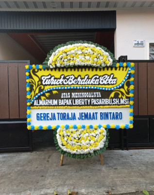 Papan Bunga Duka di Danowudu